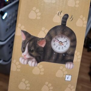 Cat Shaped Clock with Black and White Design